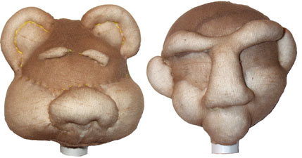 Фиксация сформированных деталей головы куклы-перчатки из чулка с помощью швов